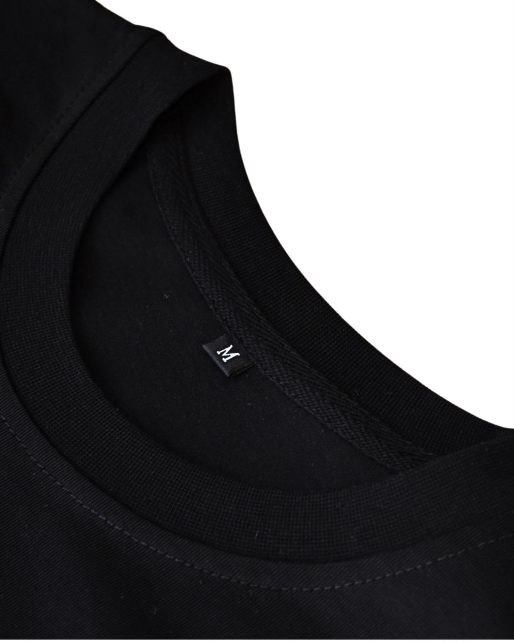 Black BP220 blank T-shirt, close-up of the inside collar and neck label