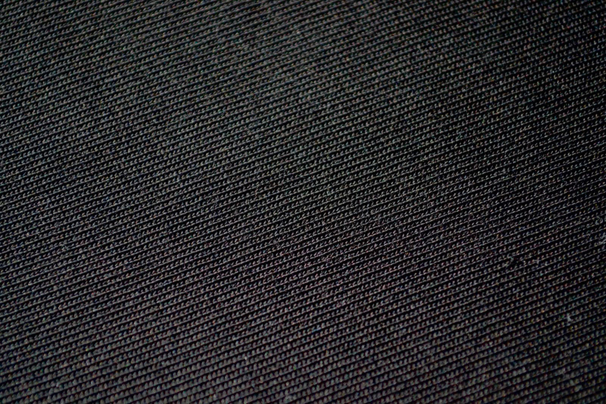 Close-up of the 220 GSM 100% cotton jersey fabric, black